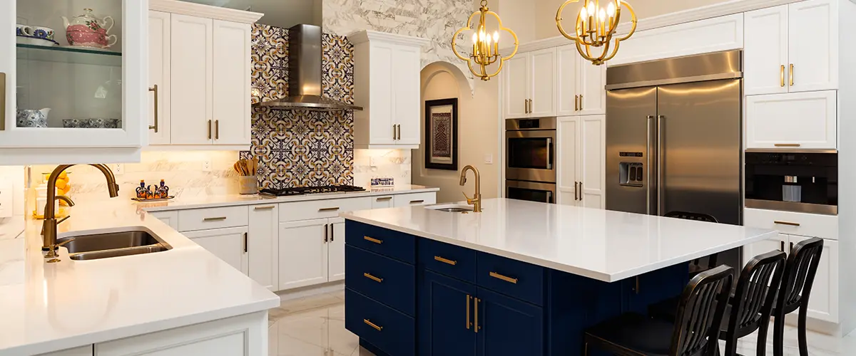 Stylish Rolesville kitchen remodel with white and blue cabinets, modern appliances.